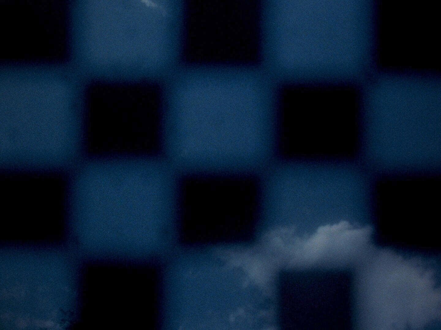 Clouds appar in a 3x3 checkerboard pattern; black alternates in the checkerboard