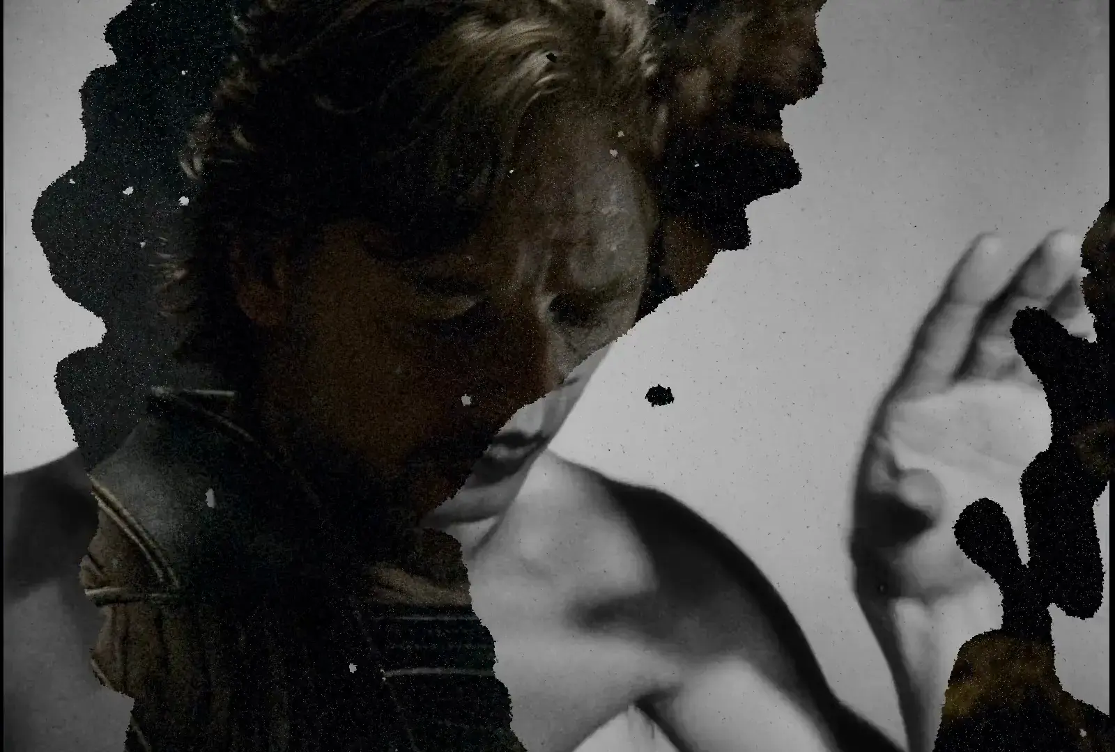 Diffusion-blended figures with hand gesture emerging from black and white collage