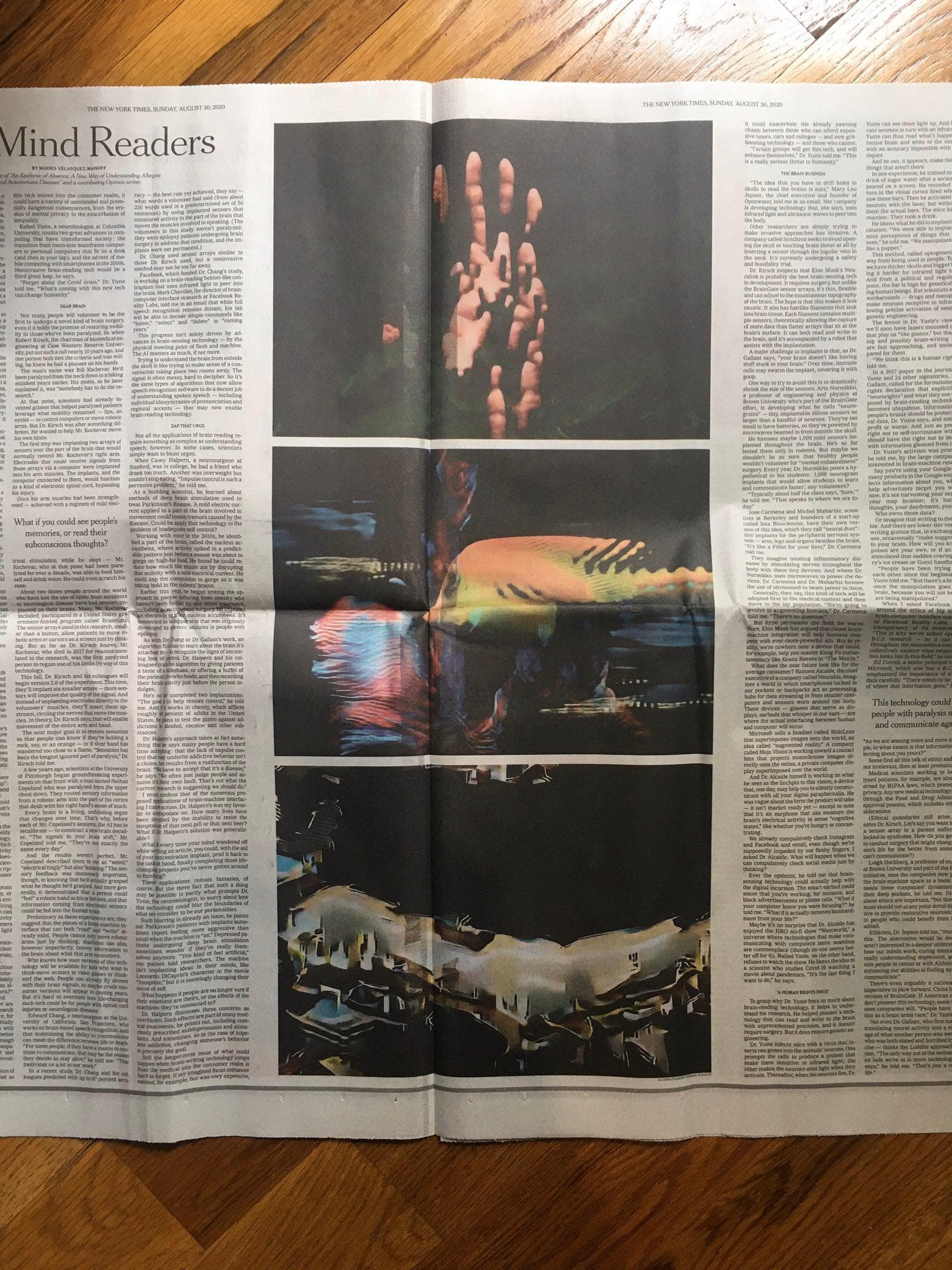 Open newspaper with three photo illustrations: a distorted hand, abstracted fish, and abstract buildings